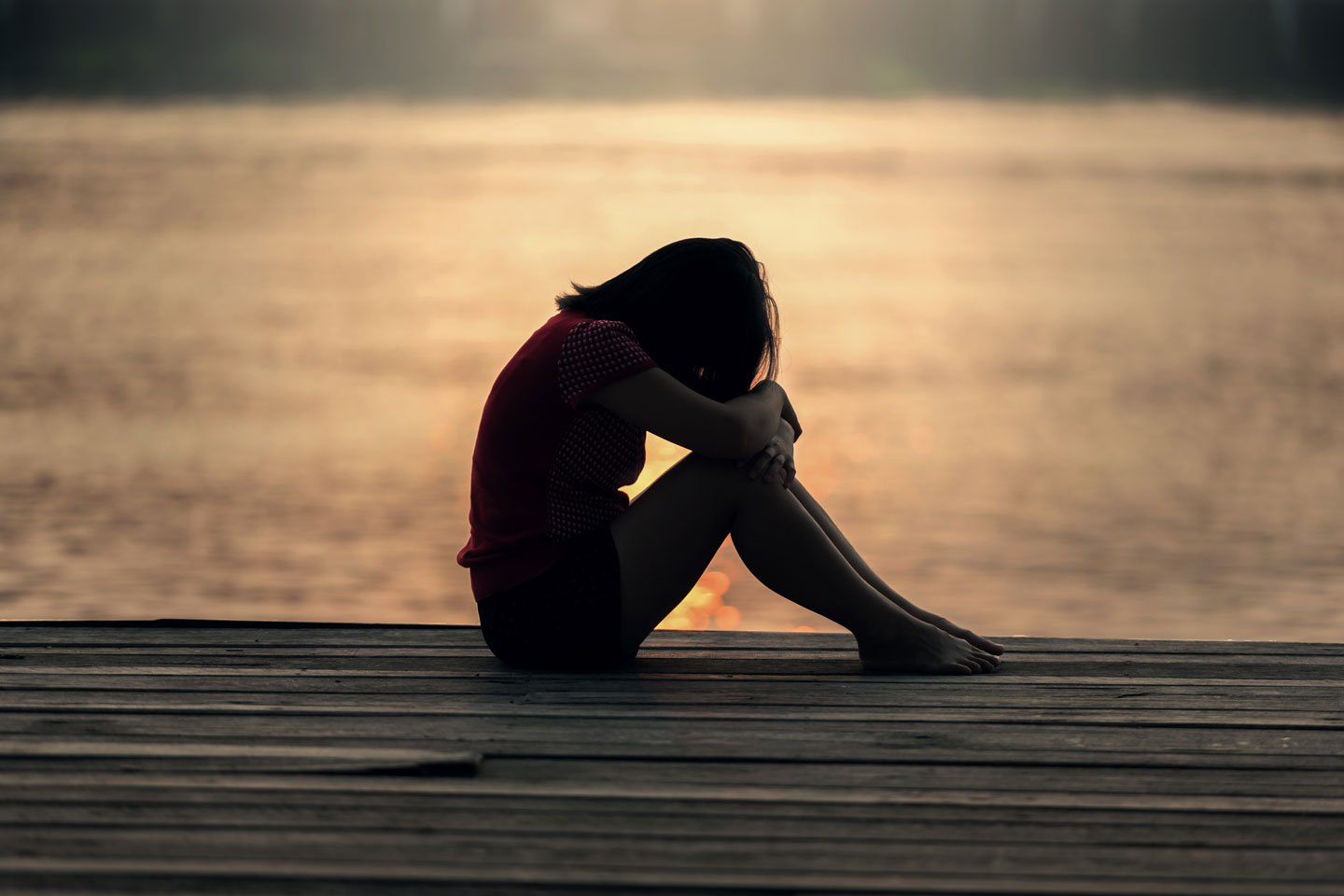 Woman alone on a dock