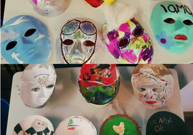 colourful masks lay on a table